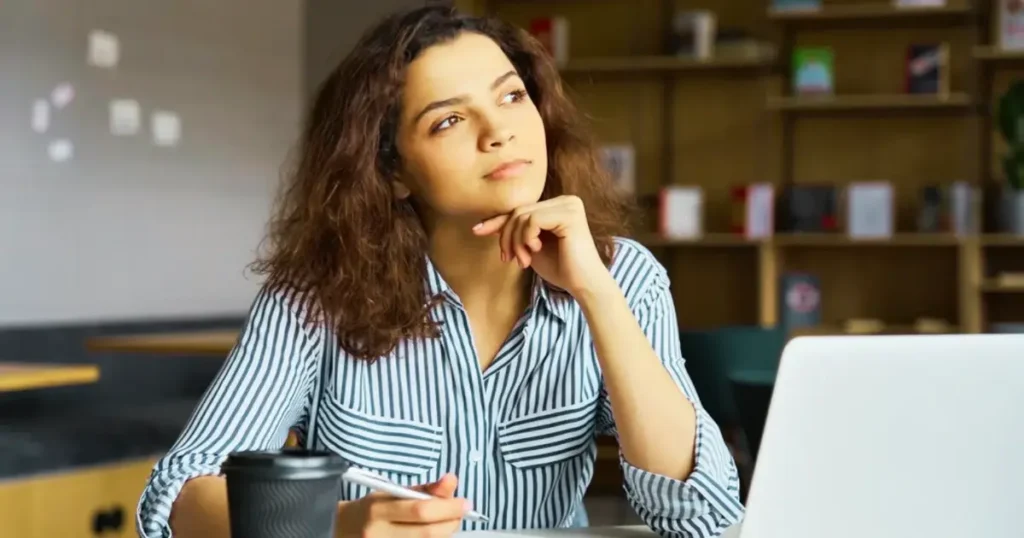 Student researching university rankings and accreditation to choose the best university