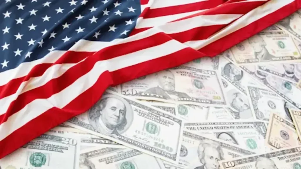 Open bank account in the USA. Close-up of US currency and the American flag