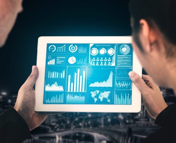 Big Data Technology for Business Finance Analytic Concept. Modern graphic interface shows massive information of business sale report, profit chart and stock market trends analysis on screen monitor.