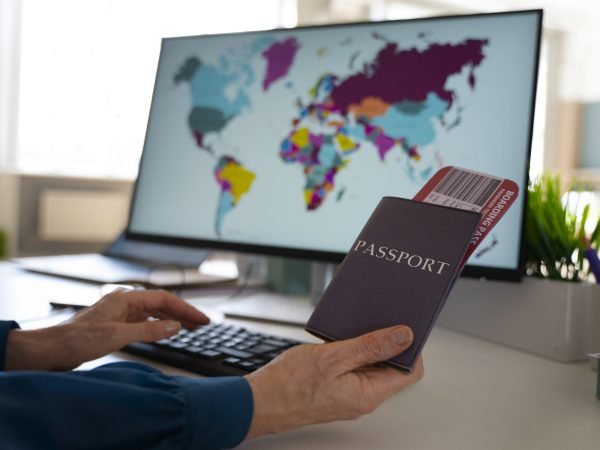 side-view-man-holding-passports